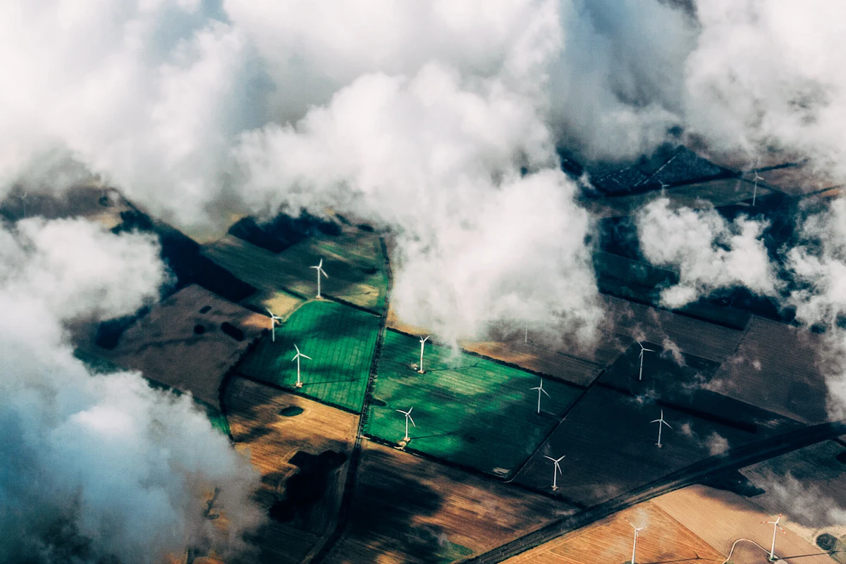 Aerial view of a wind farm spread across open fields